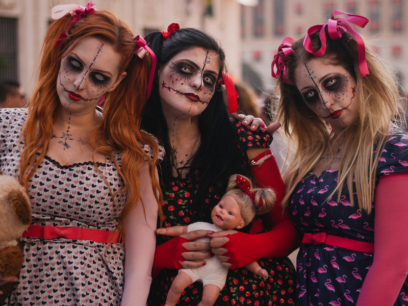 allow employees to dress up for halloween - 3 women dressed as little girl zombies